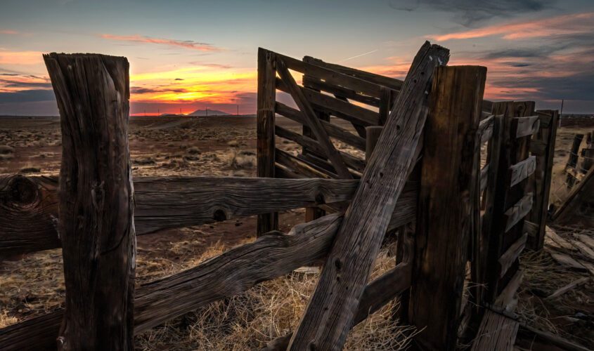 Close-up of a wooden livestock fence and gate near our Winslow, AZ hotel