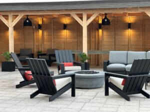 a group of chairs sitting around a fire pit