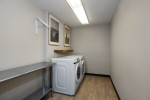 a laundry room with a washer and dryer