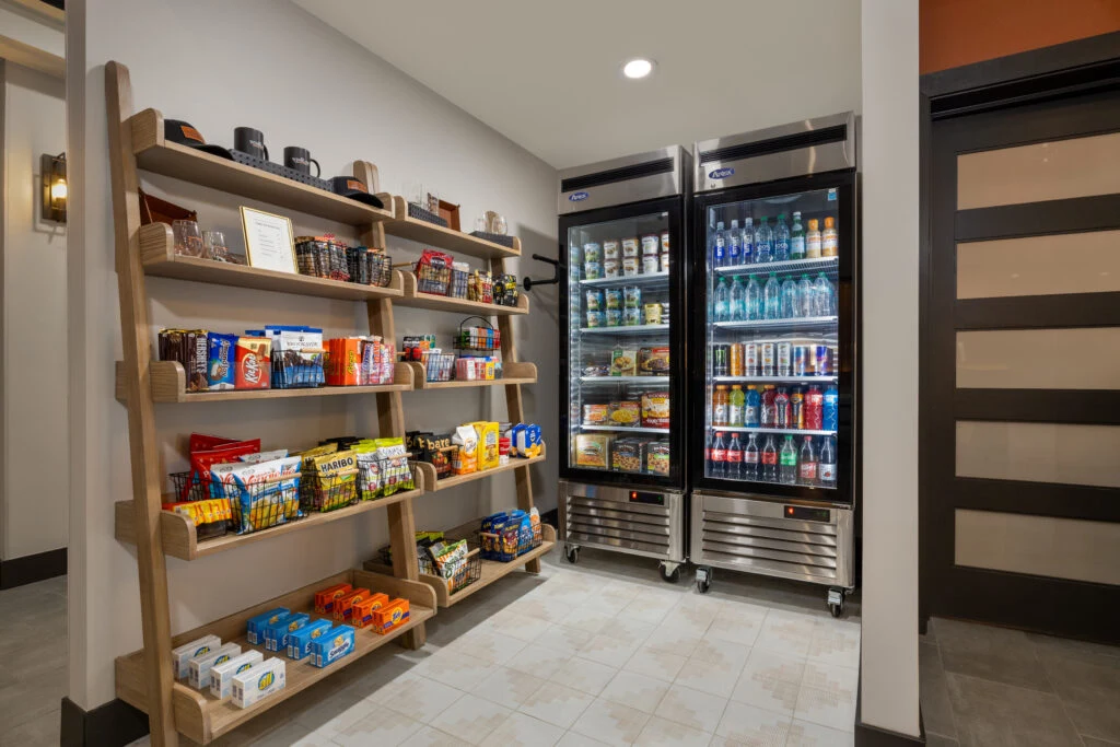 A well-stocked pantry and refrigerators offer snacks and drinks for guests at this Oklahoma City hotel.